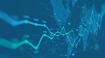 Een wereldkaart met grafieken en lijnen die opkomst en neergang van gegevens toont.